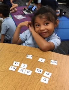 Happy child playing Switch It on desk