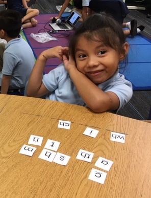 Happy child playing Switch It on desk